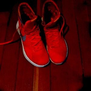 Orange and white Nike hyper dunks